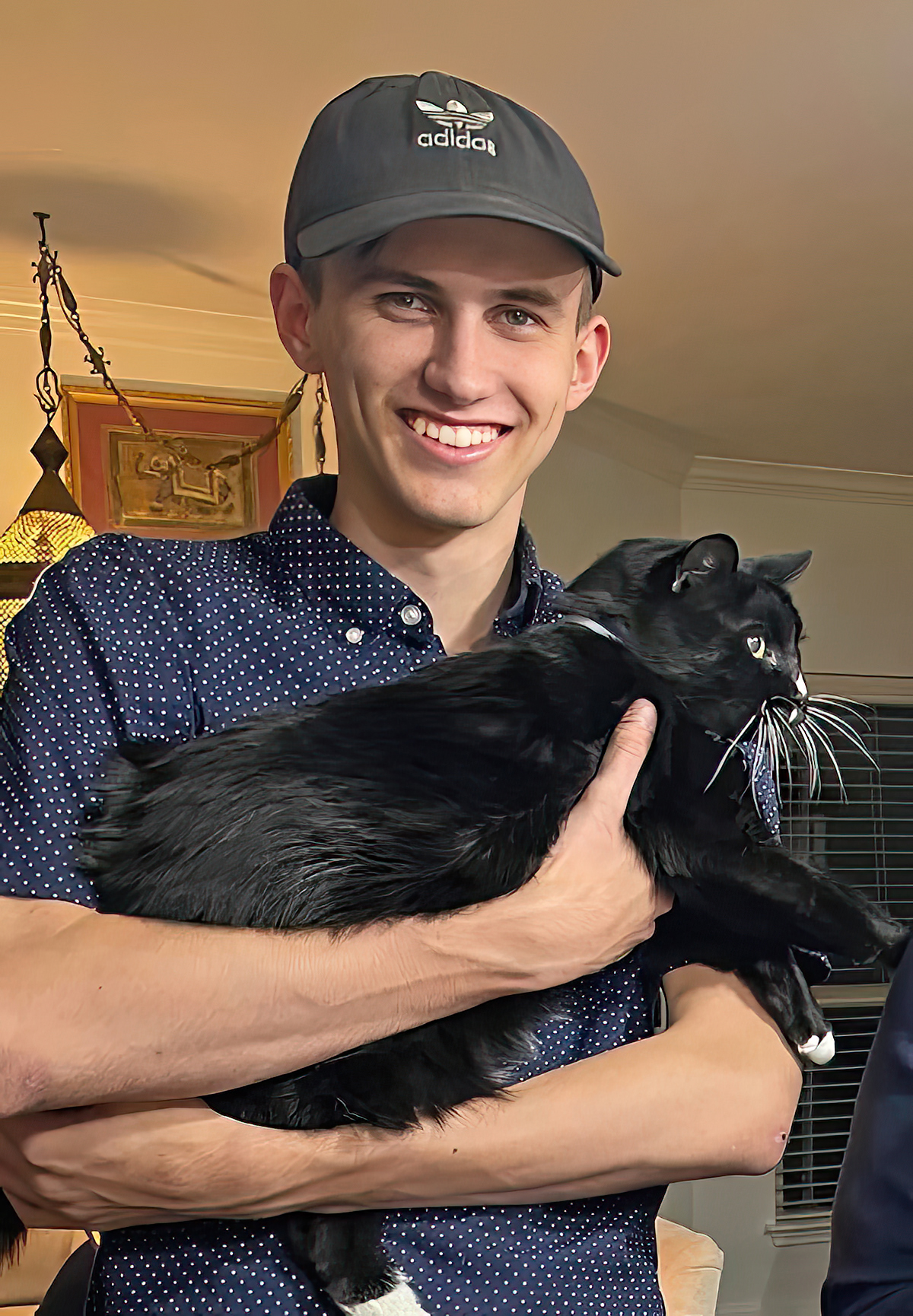 Jackson Lieber holding cat Jackson Lieber holding cat